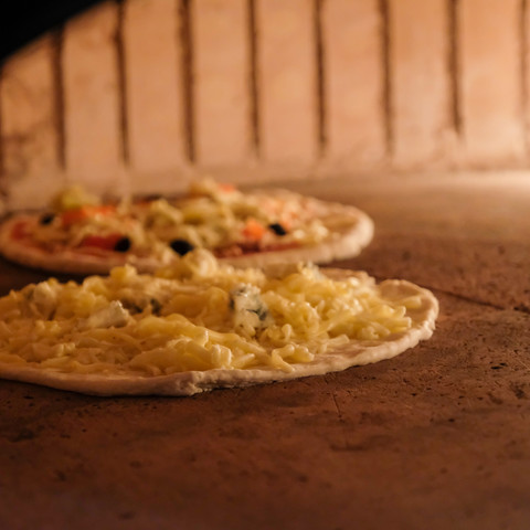 Pizzen im Ofen