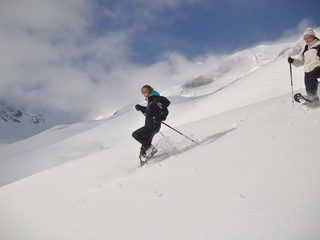 Snowshoe hike in fresh powder snow