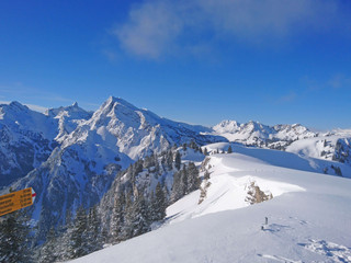 Unforgettable ski tour in snowy winter landscape on the Meniggrat