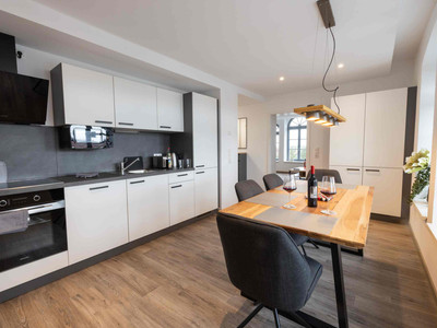 Appartement Bahn - Appartements Bett und Bike in Seesen - Küche mit Essbereich