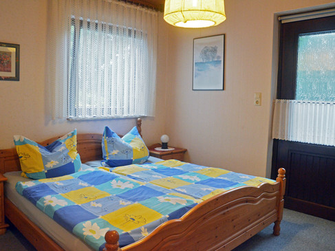 Ferienwohnung Lohmann - Schlafzimmer