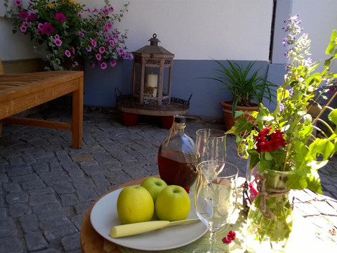 Sitz unter der Veranda