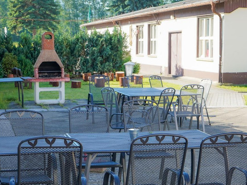 Terrasse mit Grillplatz und Feuerstelle