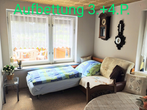 Wohnzimmer mit Aufbettung