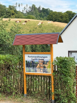 Schild & Logo von den Ferienwohnungen Nimtz