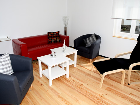 Wohnzimmer Ferienhaus "Einfach schön am Wasserfall"