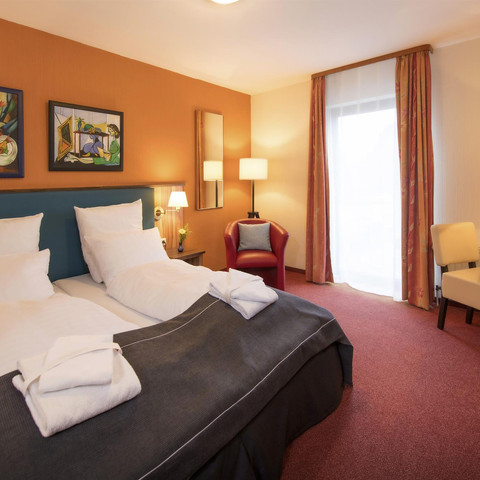 SMART-Doppelzimmer Wohnraum/Bett