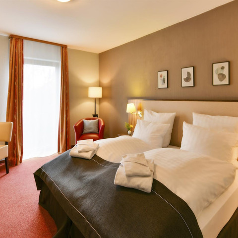 SMART-Doppelzimmer Wohnraum/Bett