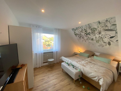 FeWo im Glück - Schlafzimmer Heidrun.jpg