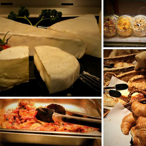 Frühstücksbuffet Großes Frühstücksbuffet mit verschiedenen Käse-, Müsli- und Gebäcksorten, inkl. Croissants.