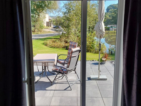 Ferienhaus am Mühlenteich, Terrasse mit Gartenmöbel Ferienhaus am Mühlenteich, Terrasse mit Gartenmöbel