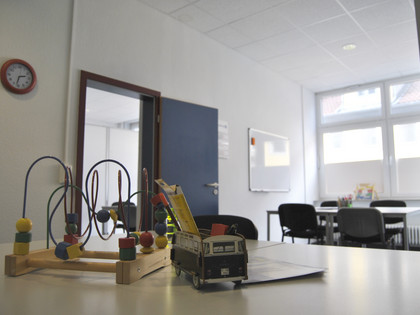 Nachhilfekreis Nachhilfekreis Tisch mit Spielzeug