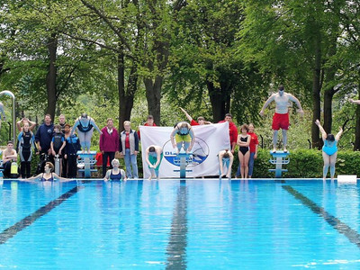 Swimming pool with starting blocks