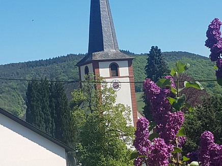 St. Martin Church Dreis with lilac