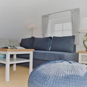 Wohnzimmer-FeWo-Flut-Haus-Wittduen