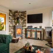 erienhäuser im Barbarossaweg Hasselfelde - Wohnbereich mit Kamin