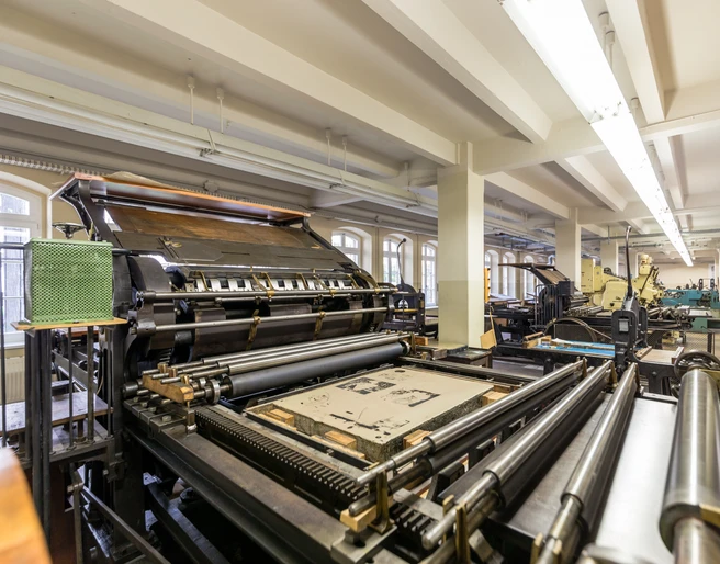 Steindruckschnellpresse im Museum für Druckkunst - Museen in Leipzig Blick auf die Steindruckschnellpresse im Museum für Druckkunst, Geschichte, KulturPohled na vysokorychlostní litografický lis v Muzeu tiskařského umění, historie, kulturaView of a rapid litho printing press in the Museum of the Printing Arts, history, cultureVue sur la presse rapide à lithographie au musée des arts de l'imprimerie, histoire, cultureSzybka prasa do litografii w Muzeum Drukarstwa, historia, kultura