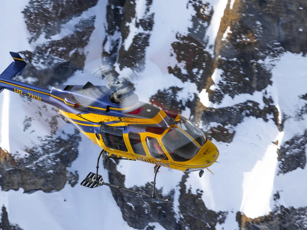Alpine lift helicopter flight Nidwalden