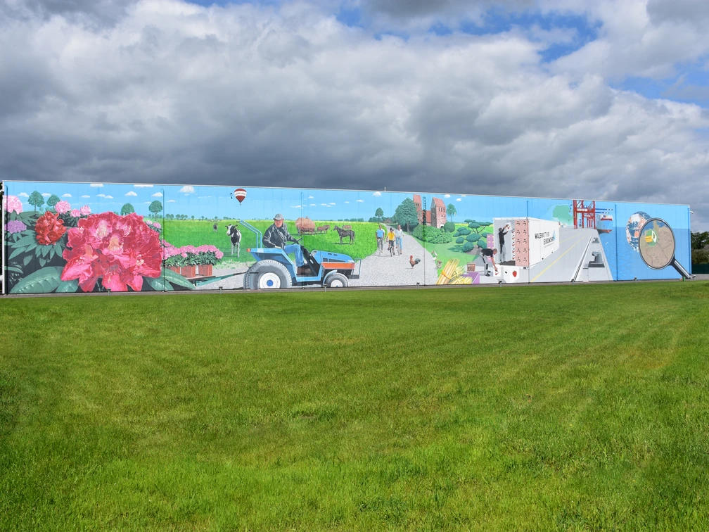 Gemälde Lager 3000 Das Bild zeigt ein Graffitigemälde an einer Hauswand des Lager 3000 in Wiefelstede