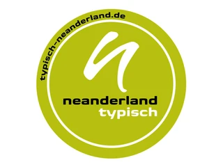TYPISCH neanderland Siegel Grünes Siegel mit weißem Schriftzug: typisch neanderland.