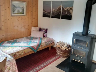 Bed next to oven