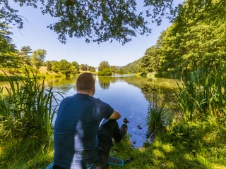 Wanderer bei der Rast am Strycksee