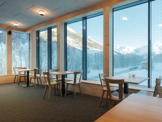 Seating area in the bistro of the Nordic Centre Goms Sitzecke im Bistro des Nordischen Zentrums GomsSeating area in the bistro of the Nordic Centre GomsCoin salon dans le bistrot du centre nordique de Conches