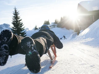 Take the sledge from Marbachegg down the valley run to Marbach