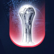 Silberner Pokal auf rotem Hintergrund vor der Lanxess Arena. Der Pokal hebt sich glänzend ab.Silver trophy on a red background in front of the Lanxess Arena. The trophy stands out brilliantly.
