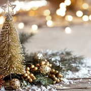 Winter cozy background with festive decor details snow wooden table bokeh concept festive atmosphere home (Klein)