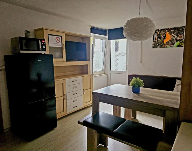 Casa_Azul_Küche.jpg Küche mit hohem Tisch und vier SitzmöglichkeitenKitchen with high table and four seats