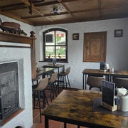 Franziskaner Stüberl Stube mit Kamin