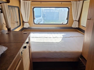 Wohnwagenvermietung-Brauweiler_Bett.jpg