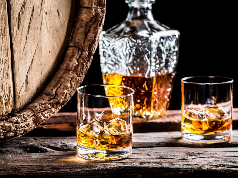 Two glasses of good whisky with ice Two glasses of good whisky with ice