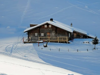 «Sennhütte Ottenschwand» Mountain hut exterior view in winter