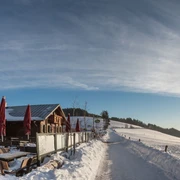 graf-stolberg-huette-winter-spektakulaerer-himmel.jpg