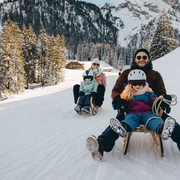 Families on sleds at the Wiriehorn