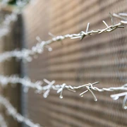 Border fence in the border landscape Sorge