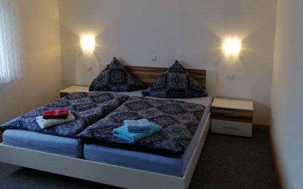 Schlafzimmer eins in der Ferienwohnung Bredehöft