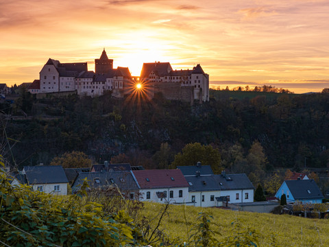 Die Burg Mildenstein im herbstlichen Sonnenuntergang